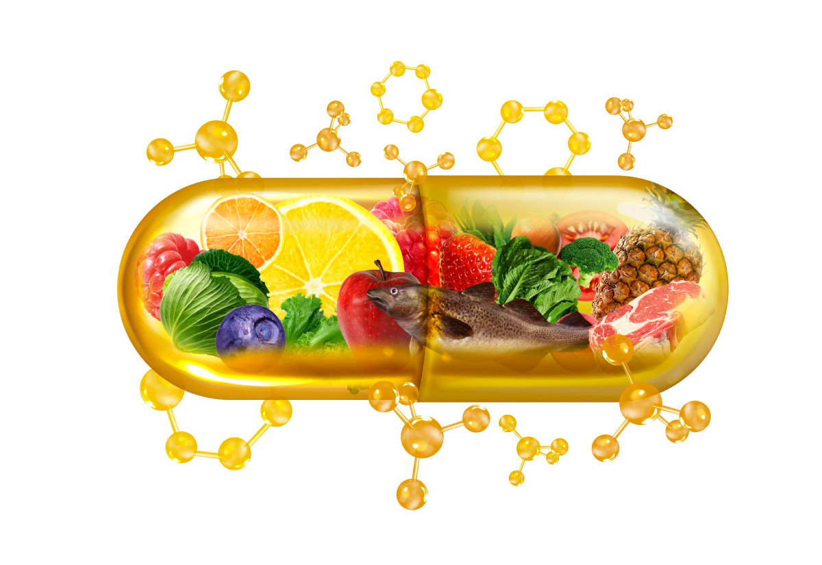 метафоричне зображення капсули з вітамінами, в якій всередині зображені продукти, в яких вони містяться